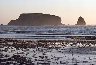 Corps-Mort, uninhabited rock, from the island of Havre-Aubert at low tide.