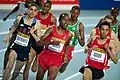 Abdalaati Iguider (far right) en route to victory in the 1500 metres.