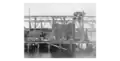 Photographed between 1873 and 1874, construction of the Miramichi Bridges on the Intercolonial Railway - Southwest Branch. Pier F; built by Hugh Ryan and his firm Brown, Brooks & Ryan.