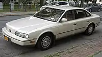 1990–93 (pre-facelift, with cloisonné front insignia)
