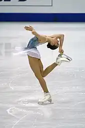 Layback spin with catch-foot