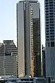AMP Place. Brisbane.  Completed in 1977.  An early example of late modern curtain walled mirror glass skyscraper.