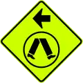 (W6-V2-2) Pedestrian Crossing Ahead on Side Road (turn left) (used in Victoria and South Australia)
