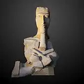 Statue of Akhenaten; c. 1350 BC; painted sandstone; 1.3 × 0.8 × 0.6 m; Louvre