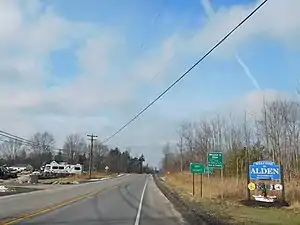 Signage entering the town of Alden on U.S. Route 20 westbound.