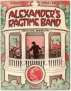 A cover by artist John Frew depicting a fictional bandleader Alexander and his men performing in a bandstand.