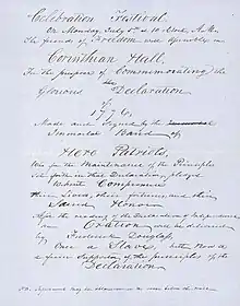 A handwritten announcement of the date and time of the speech