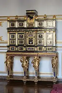 Baroque caryatids of a cabinet; c.1675; ebony, kingwood, marquetry of hard stones, gilt bronze, pewter, glass, tinted mirror and horn; unknown dimensions; Musée des Arts décoratifs, Strasbourg, France