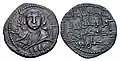 Coinage of Kara Arslan, dated AH 562 (1166-7 CE). Artuqid coinage was very figural, "with its apparent classical and Byzantine motifs and representations".