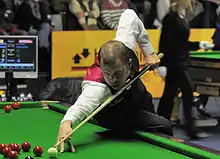 Barry Hawkins playing a shot