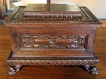 Renaissance cartouche on a chest, 16th century, walnut, Palazzo Davanzati, Florence, Italy