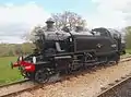 British Railways 2-6-2T Class Ivatt Two No. 41298 runs round the train at Wootton