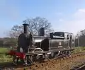 The railway's flagship locomotive, British Railways 0-4-4T W24 'Calbourne' runs round the train at Wootton