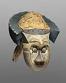 Pwoom Itok mask; late 19th century; 39.1 x 28.6 x 29.8&nbsp;cm (153⁄8 x 111⁄4 x 113⁄4 in.); Brooklyn Museum (USA). This mask may have represented a wise older man at boys' initiations. One of the principal Kuba dance masks is called pwoom itok. The chief identifying characteristic is the shape of the eyes, whose centers are cones surrounded by holes through which the wearer sees