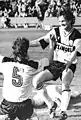 Gütschow celebrates with Steffen Büttner (number 5) during a 3–0 win against Rot-Weiß Erfurt in 1990.