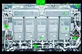 One of the four Controller Panel Assemblies (CPA) bolted to a hatch beam during STS-102 in 2001. Each CPA has one Capture Latch controller (1), four Powered Bolt controllers (2) and circuitry to condition input power (3). A bracket (4) for installation of the M/D "center section" cover is visible on either side of the CPA. The photograph was taken from the PCBM side of the mated vestibule, looking back into the ACBM. The basic individual controller design is also used for the Carbon Dioxide Removal Assembly's Pump Fan Motor Controller, Vent and Relief Valve, and Internal Thermal Control System valves.
