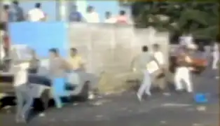 Looters running with stolen goods