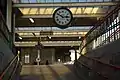 Carnforth railway station clock and ramp from subway under platforms