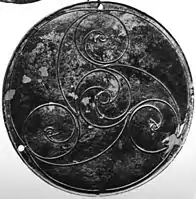 Bann disc, bronze with triskele decoration