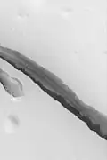 A 3&nbsp;km section of a Cerberus Fossae fissure, taken by the Mars Global Surveyor (MGS) Mars Orbiter Camera (MOC)