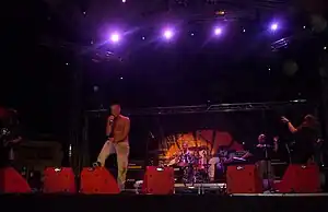 Clawfinger performing in 2009. From left to right: André Skaug, Zak Tell, Micke Dahlénn, Jocke Skog and Bård Torstensen.
