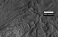 Close-up of Fretted Terrain near Reull Vallis, as seen by HiRISE.  This area would be a challenge to walk across.