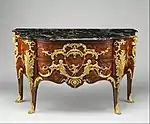 Rococo commode; by Charles Cressent; c.1745–1749; pine and oak veneered with amaranth and bois satiné, walnut, oak, pine; gilt-bronze, portoro marble top; 87.6 x 139.7 x 57.8&nbsp;cm; Metropolitan Museum of Art