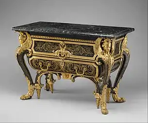 Commode; by André-Charles Boulle; c.1710–1732; walnut veneered with ebony and marquetry of engraved brass and tortoiseshell, gilt-bronze mounts, antique marble top; 87.6 x 128.3 x 62.9&nbsp;cm; Metropolitan Museum of Art (New York City)