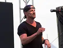 Powter performing at the Festival of Friends in 2013