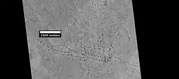 Rootless Cones, as seen by HiRISE under HiWish program. These group of rings or cones are believed to be caused by lava flowing over water ice or ground containing water ice. The ice quickly changes to steam which blows out a ring or cone.