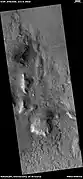 Wide view of fractured ground,  as seen by HiRISE under HiWish program. Cracks form on the Martian surface, and then they turn into large fractures.