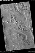 Row of mounds, as seen by HiRISE under HiWish program.  Arrows point to some of the mounds.