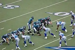 Donovan McNabb (#5) calls plays to Matt Schobel (#89).