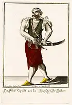 Man stepping forward about to pull out a scimitar