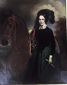 A portrait of a woman standing next to a horse.