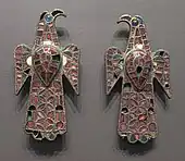 The Eagle-shaped fibulae of Alovera; 5th century; gold, bronze and glass (imitation of garnet); height: 11.8 centimetres (4.6&nbsp;in), width: 5.9 centimetres (2.3&nbsp;in); from Guadalajara (Spain); National Archaeological Museum (Madrid, Spain)