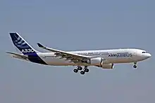 Twin-engine passenger jet in flight