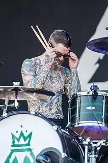 Hurley performing with Fall Out Boy in 2014
