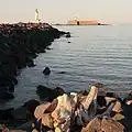 Fort de Brescou and lighthouse at the end of the pier