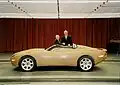 Ted Loades with Ford COO, Sir Nick Scheele and Jaguar XK180 concept (1997).