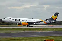An AirTanker demilitarised Airbus A330-243 G-VYGK (MSN: 1498) wet-leased to Thomas Cook Airlines at Manchester Airport, 2015.