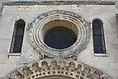 Romanesque oculus of the Église Sainte-Anne de Gassicourt&nbsp;[fr], Mantes-la-Jolie, France
