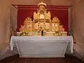 Gilt and polychrome wood altarpiece or retable in the church, made in the 17th century for the Carthusian monastery of Vauclair, Montpon