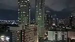 Holiday Inn Manila (foreground) with Park Terraces, Makati Fairmont Hotel, and Raffles Makati on the background. Also shown is the Glorietta 1 Corporate Center (right).