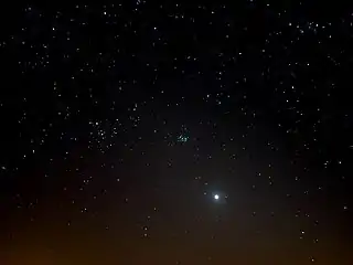 The bright Venus in the cone of the zodiacal light 8&nbsp;degrees above the western horizon on 23&nbsp;March 2020. This was eleven days before Venus approached the Golden Gate of the Ecliptic (centre) between the Pleiades (right) and the Hyades together with Aldebaran (left) in the constellation Taurus (centre).