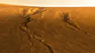 Gullies on central uplift of Lyot crater, image reprocessed from HiRISE data.