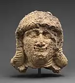 Female head; circa 2000–1600 BC; ceramic; 18 x 12.7&nbsp;cm; Metropolitan Museum of Art (New York City)