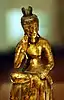Pensive Bodhisattva Maitreya. Hakuho period or possibly Three Kingdoms of Korea period, 7th century. Gilt bronze, h. with pedestal 31&nbsp;cm. Tokyo National Museum.