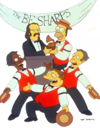 Four barbershop quartet singers, with one handing an award to a mustached man in a suit
