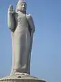 Standing Buddha in abhya mudra
